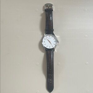 Movado men’s watch with brown leather alligator strap